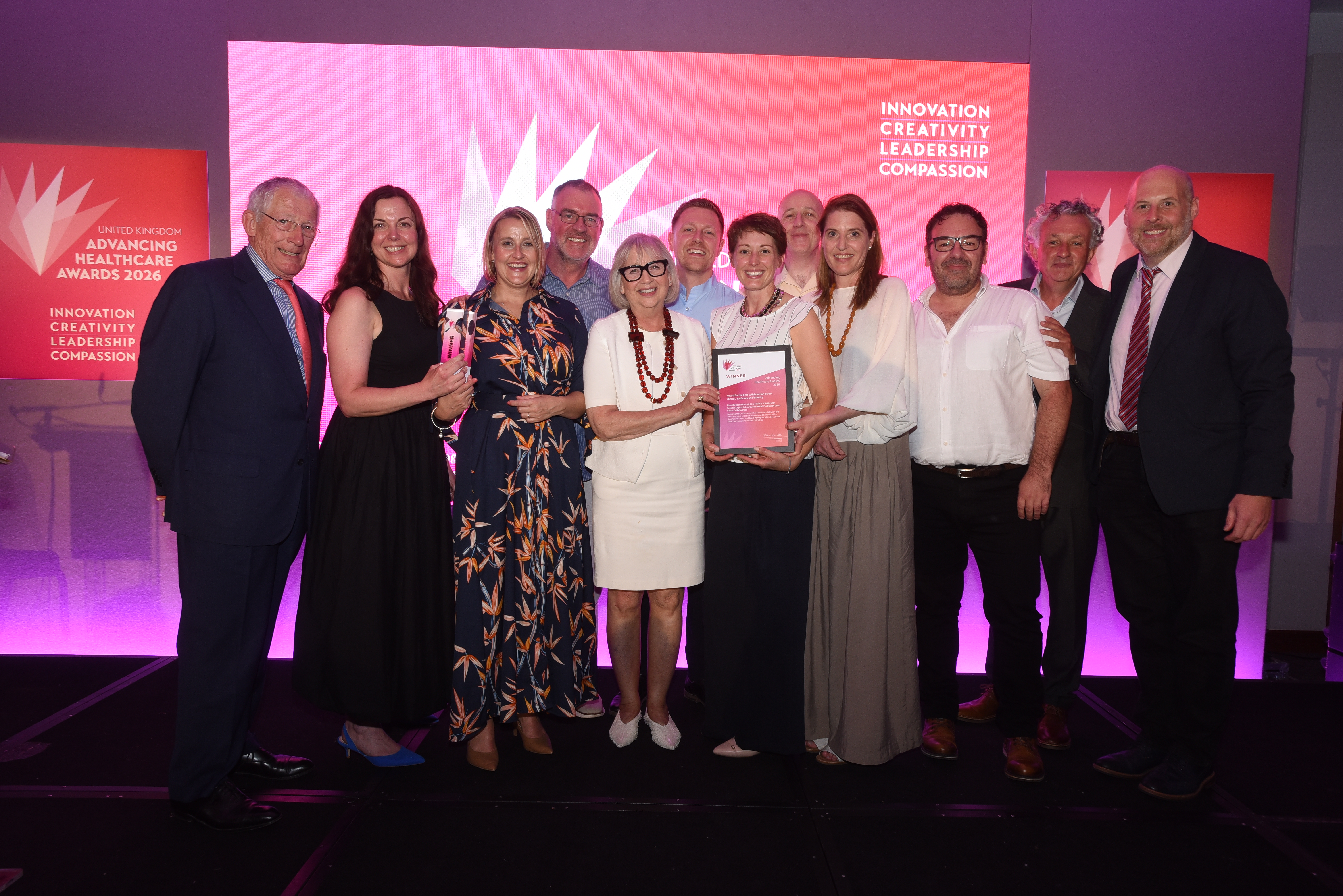 The NROL team receiving the Advancing Healthcare Awards (AHA) 2026 for the best collaboration across clinical, academia and industry